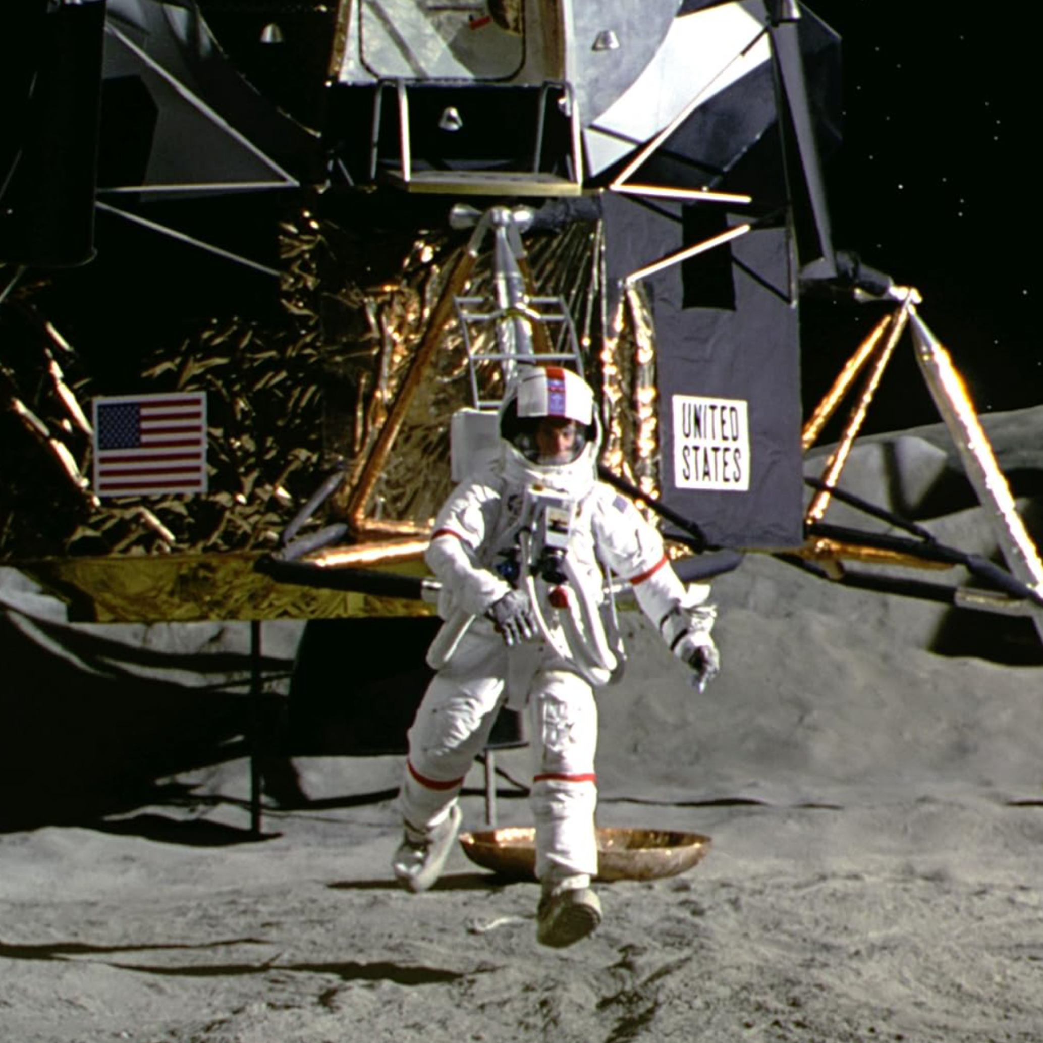 Film still of a scene from "Apollo 13": An astronaut walking on the surface of the moon.