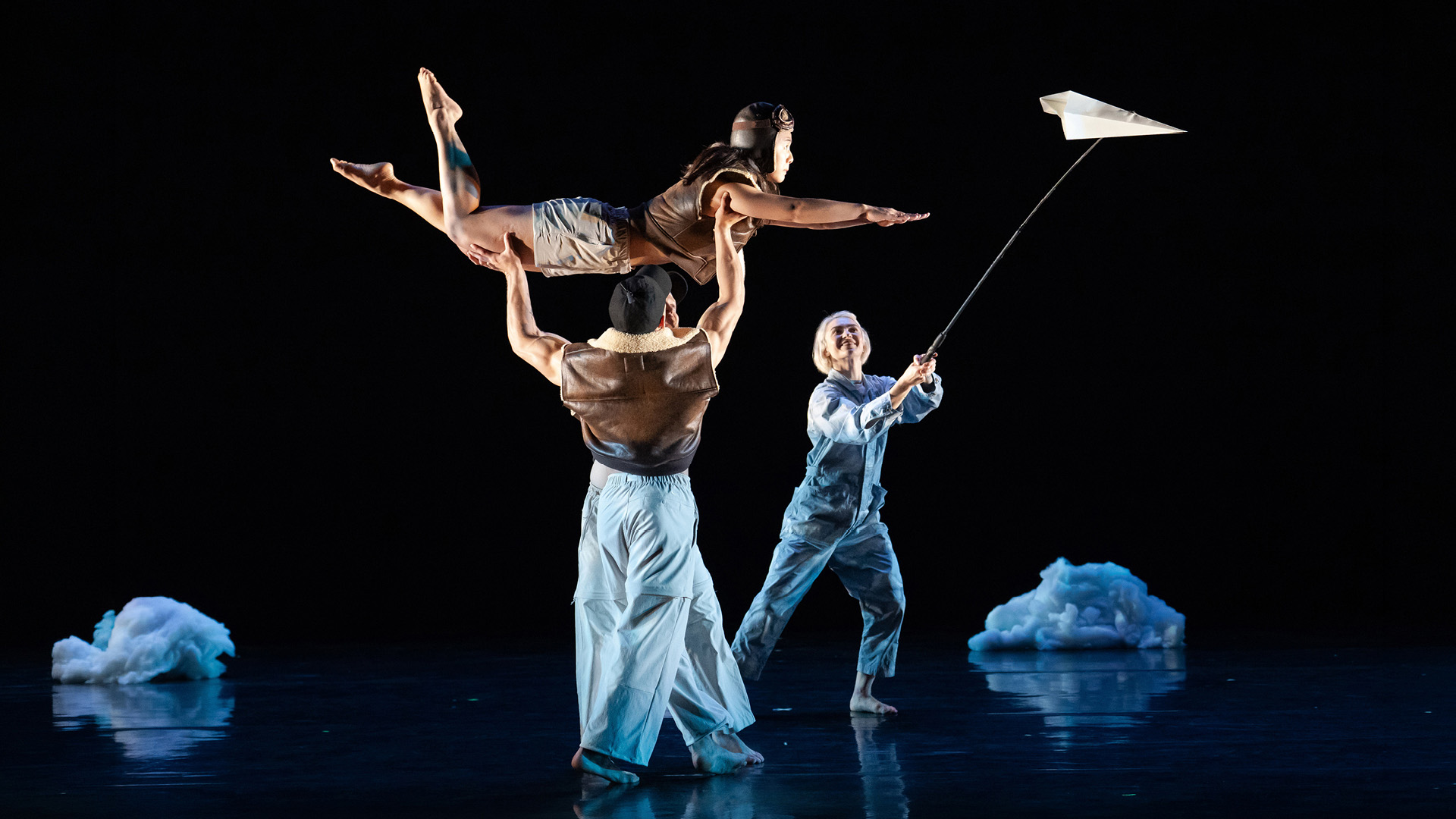Three Pilobolus dancers performing choreography from Trips.