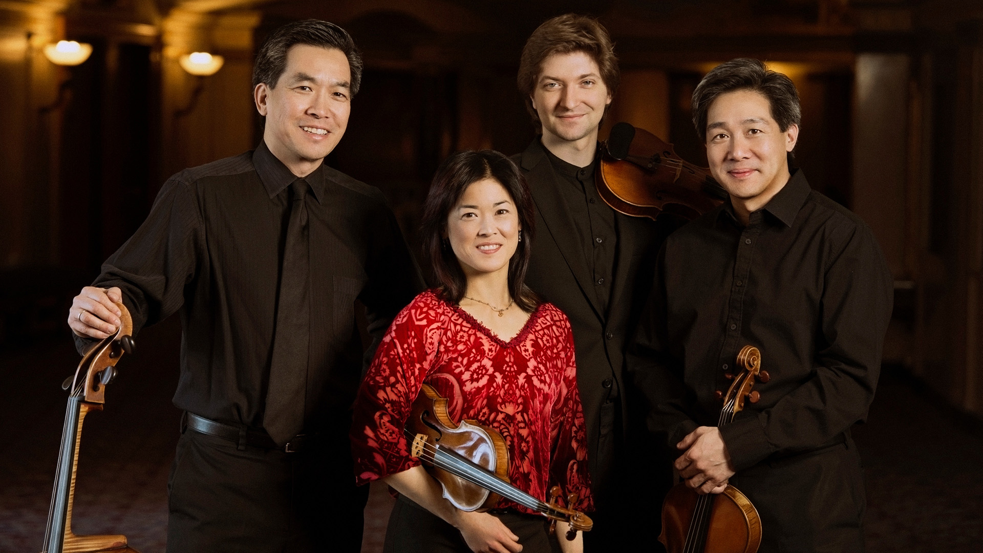 Ying Quartet members with instruments.